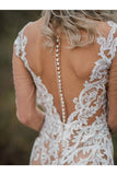 Robe de mariée bohème à manches longues avec appliques en tulle sirène