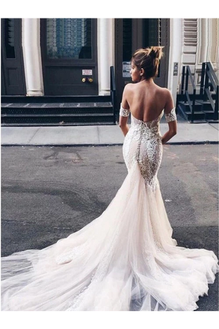 Charmante sirène sweetheart dos nu robes de mariée en tulle avec des applications et des perles