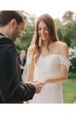 Robe de mariée sirène en dentelle avec décolleté épaule et traîne chapelle